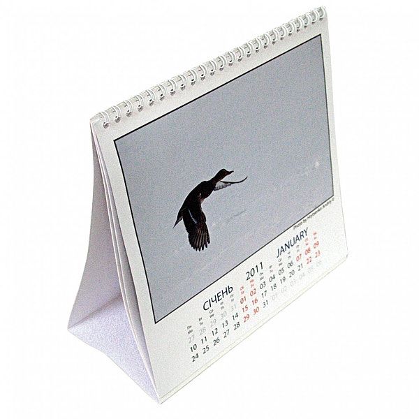 Настольный календарь-домик с перекидными листами.