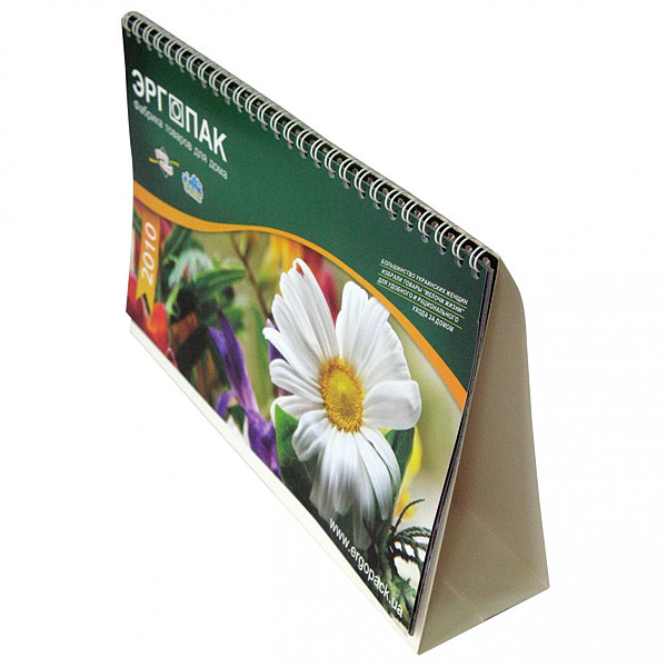 Настольный календарь-домик с перекидными листами.